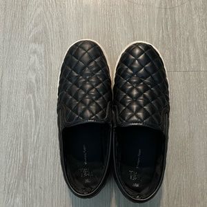 Black slip ons